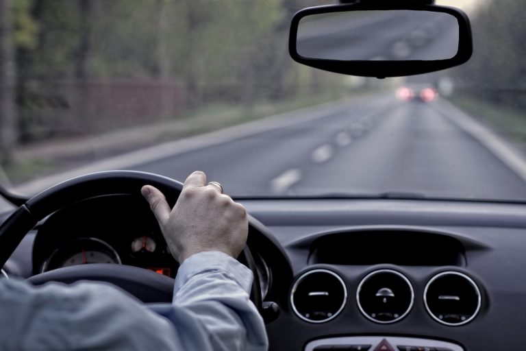 image of private driver driving car
